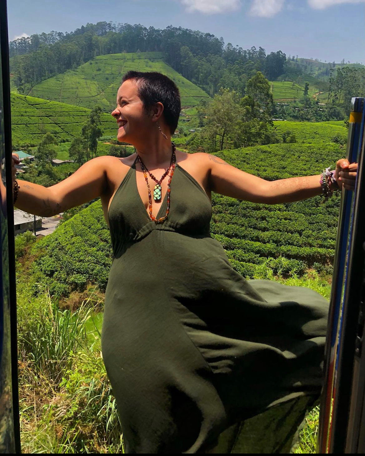 Free spirit Hippie Tegs Modelling Labradorite Crystal Necklace whilst travelling across the world on a train.