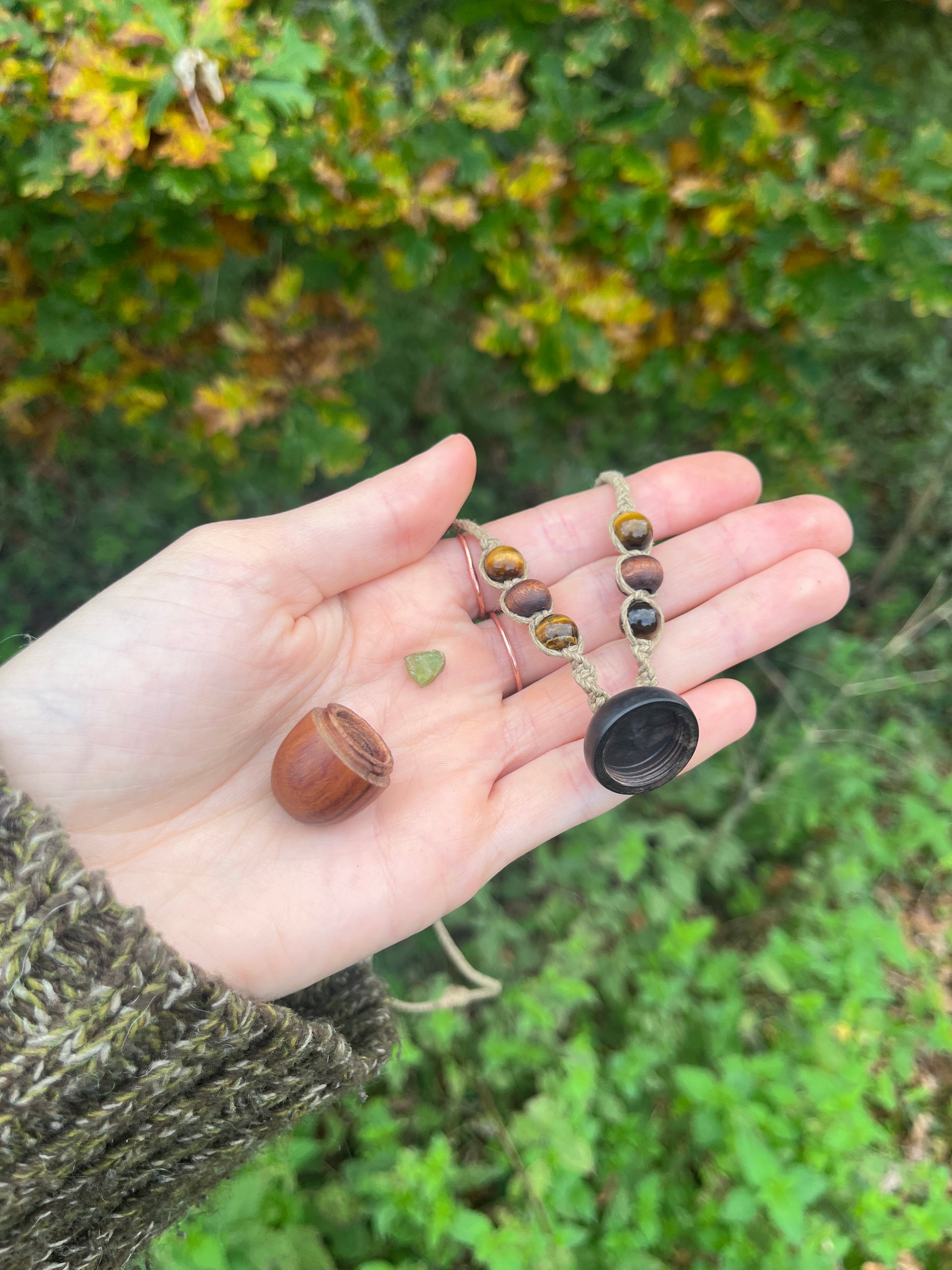 Handmade Acorn Trinket Necklace fairy-core pendant. In use. 