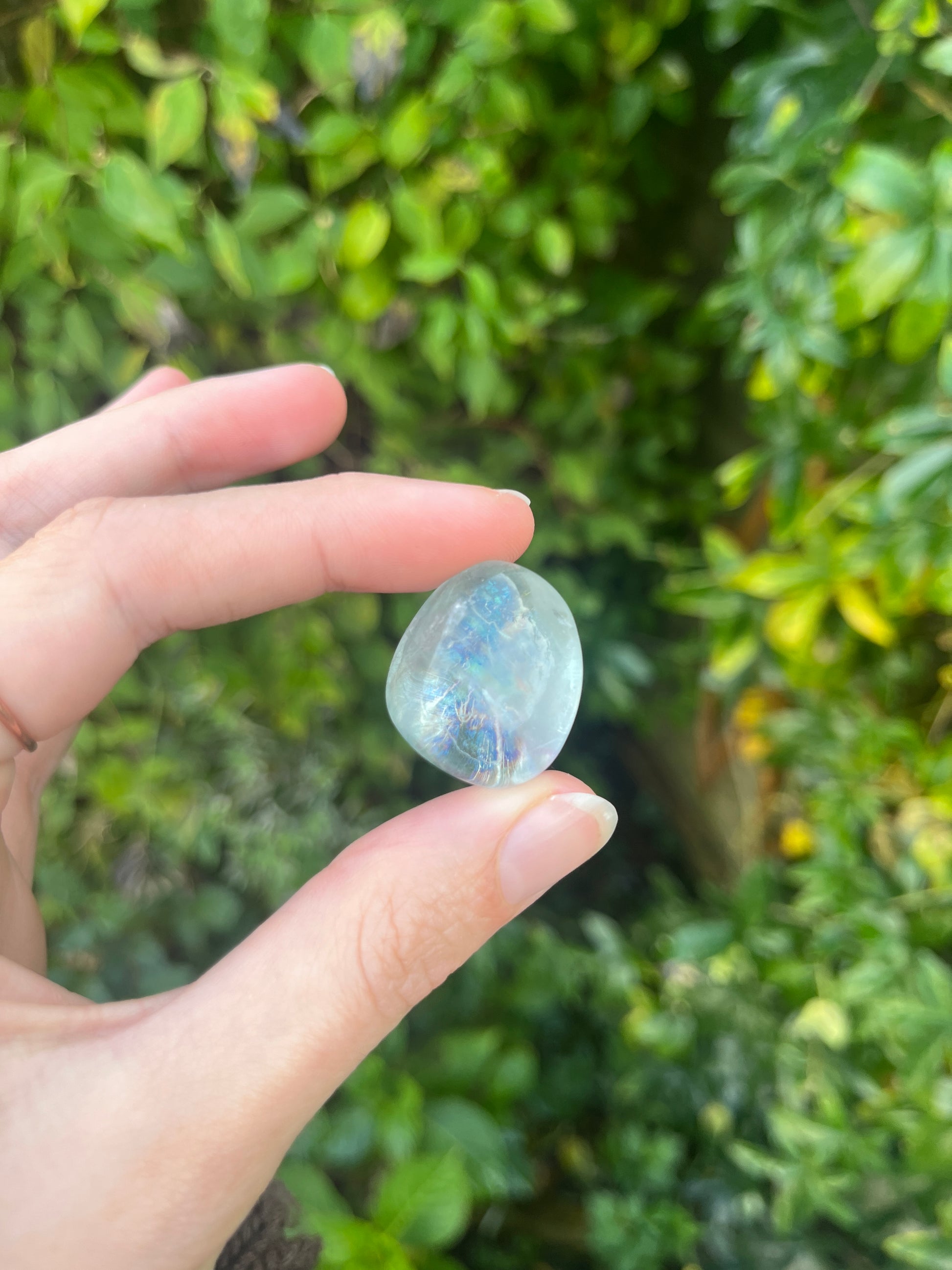 crystal tumblestone in hand - prasiolite