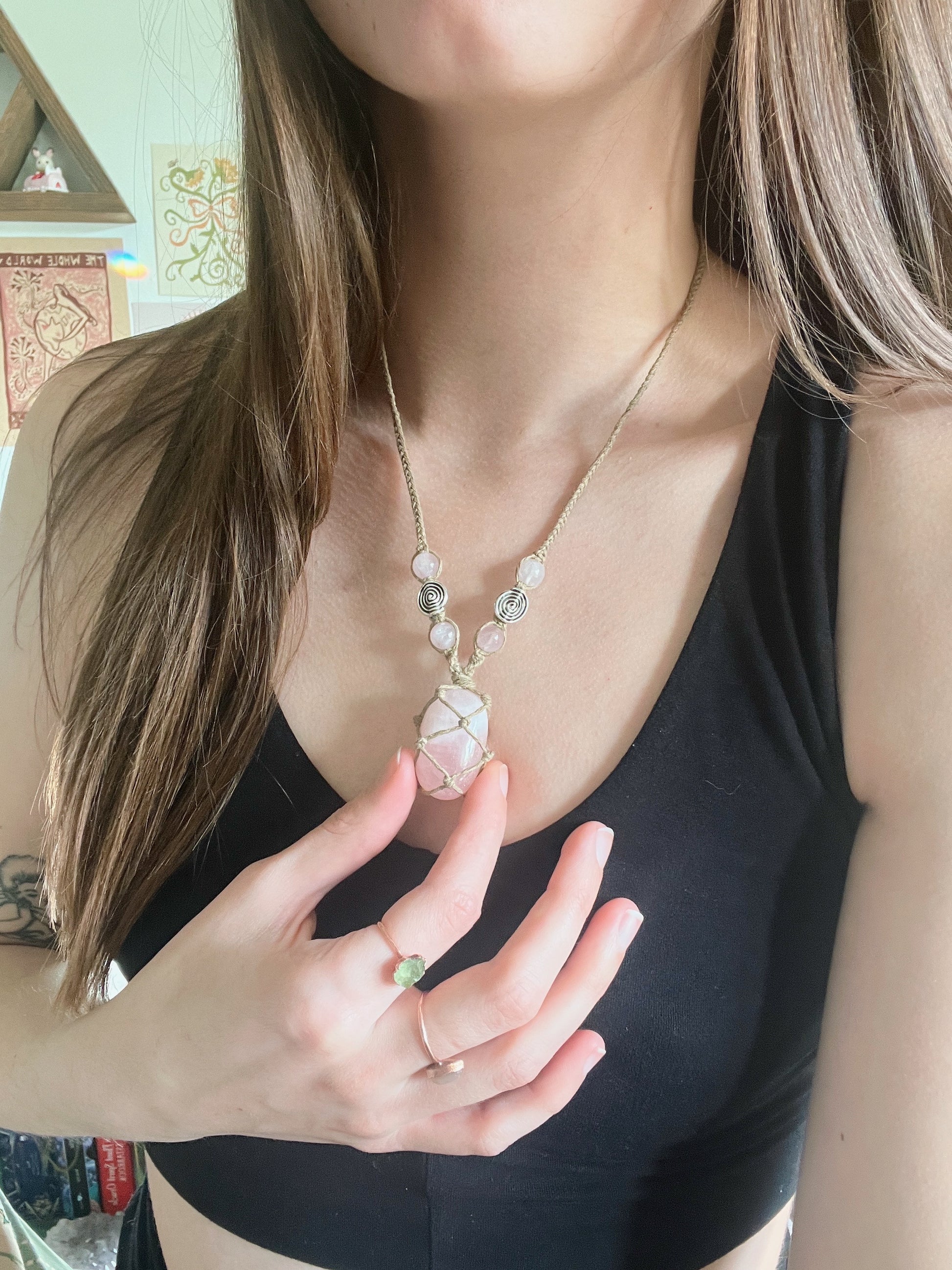 A handmade macrame Rose Quartz crystal necklace, the perfect ally to support you through your personal spiritual journey.