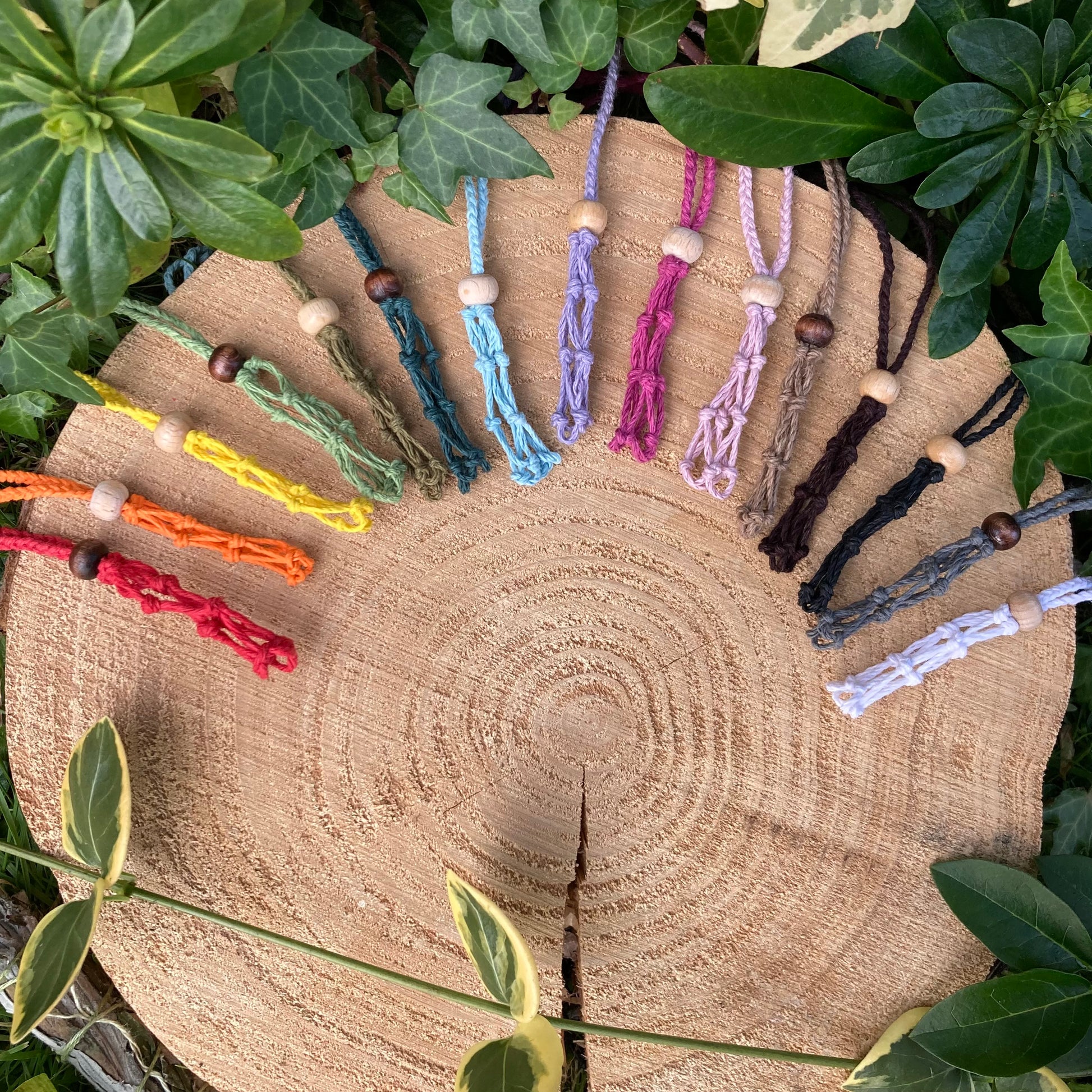 rainbow selection of hemp crystal pouch necklaces, the perfect necklace to hold your favourite healing gemstones.