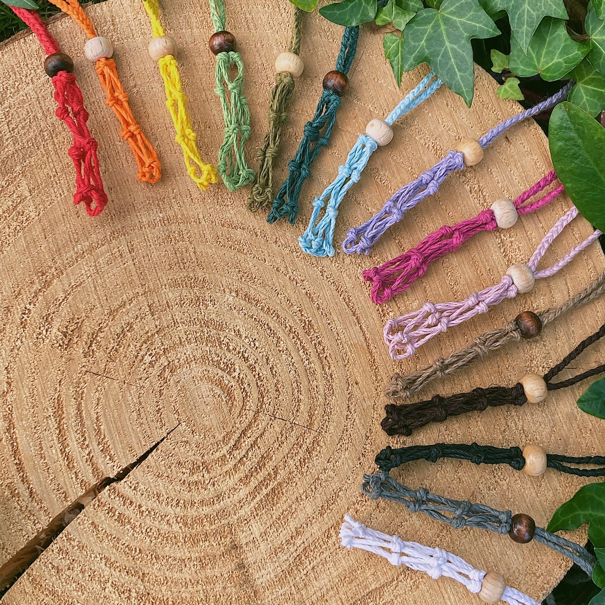 rainbow selection of hemp crystal pouch necklaces, the perfect necklace to hold your favourite healing gemstones.